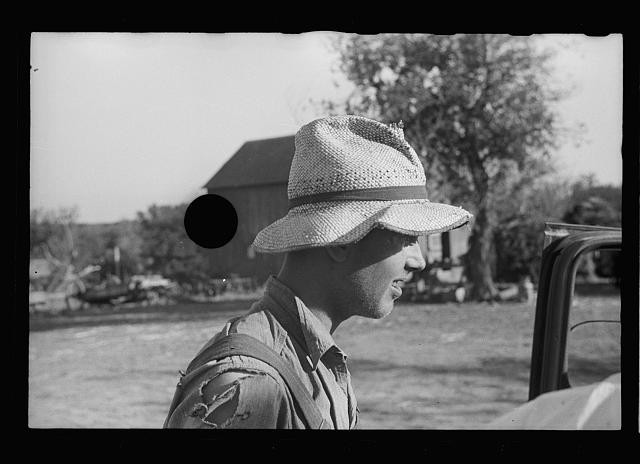 Photo:Gage County Nebraska 1938 Rehabilitation Client Rolling Cigarette