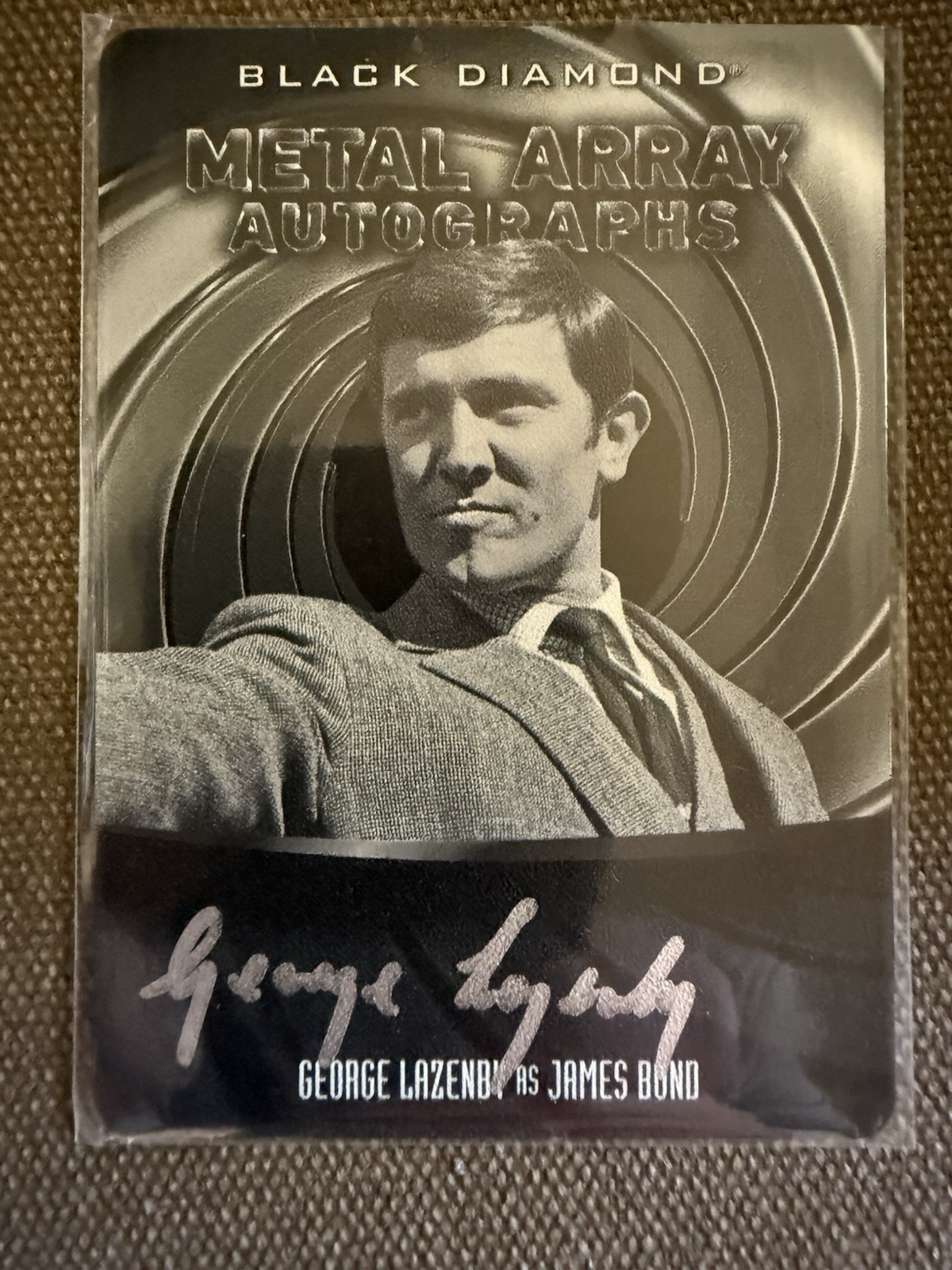RARE 2024 JAMES BOND BLACK DIAMOND GEORGE LAZENBY AUTO METAL ARRAY /199