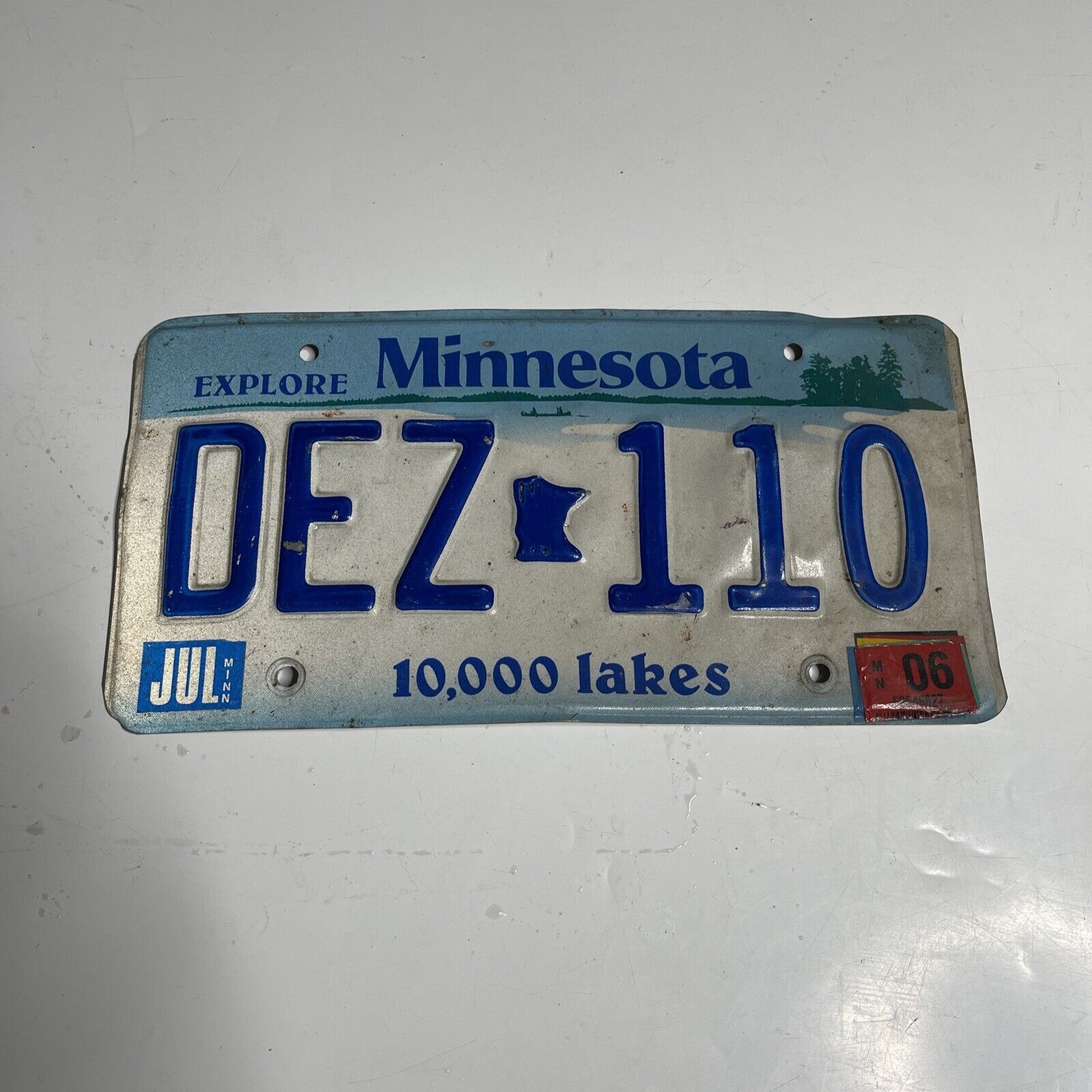 Minnesota License Plate # DEZ 110 Sticker Blue White 2006