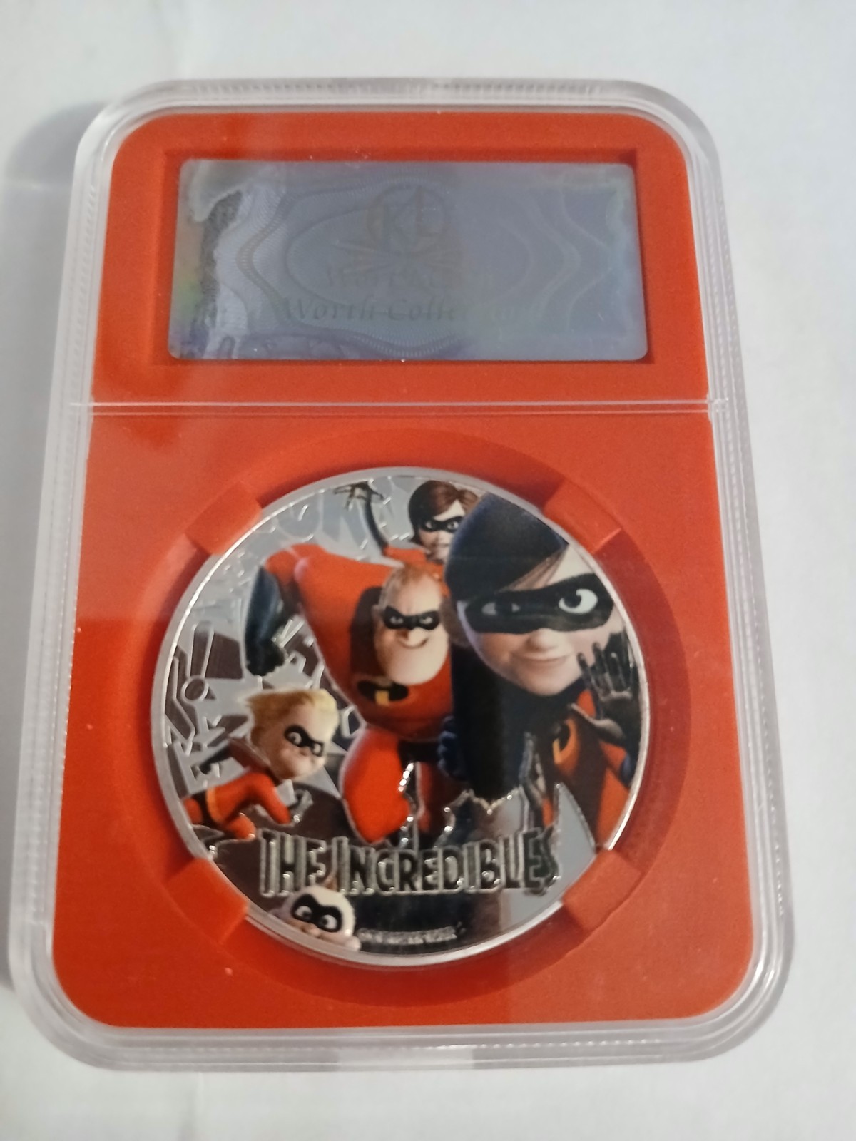 The Incredibles silver plated medallion in  protective slab
