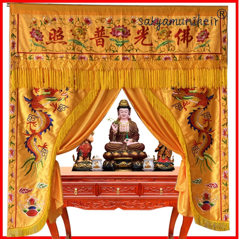The Buddha's light shines on the lotus blocking the door curtain and the curtain