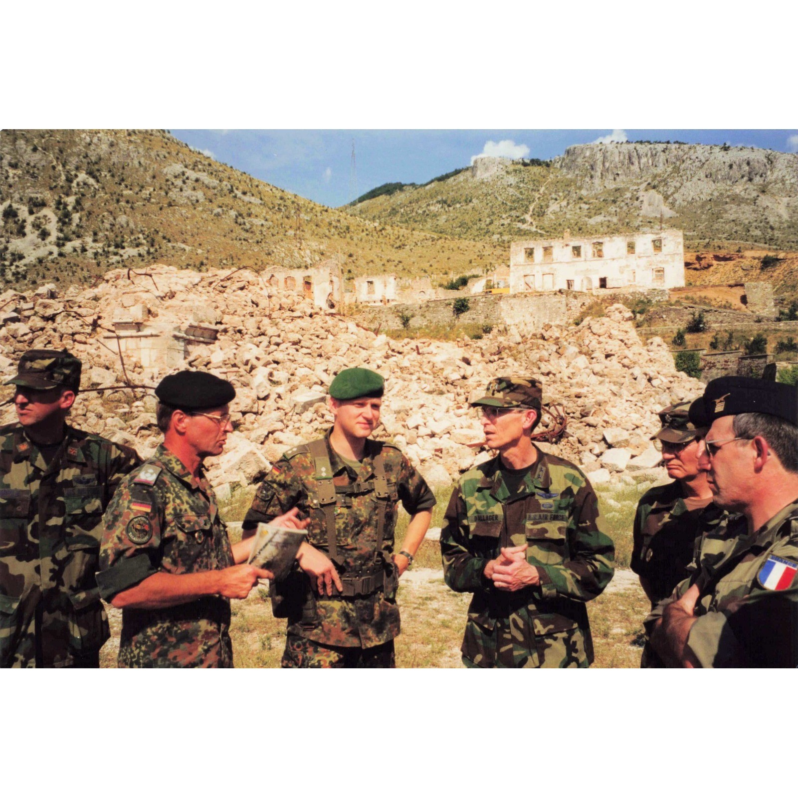 Vintage 1990s SFOR Bosnia Multinational Officers Rubble Site Named Photo