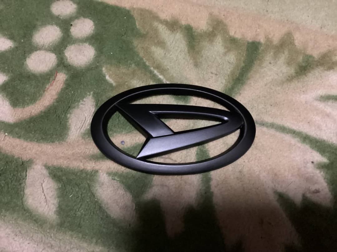 Atrai S320G, S330G Matte Black Emblem Rear Genuine