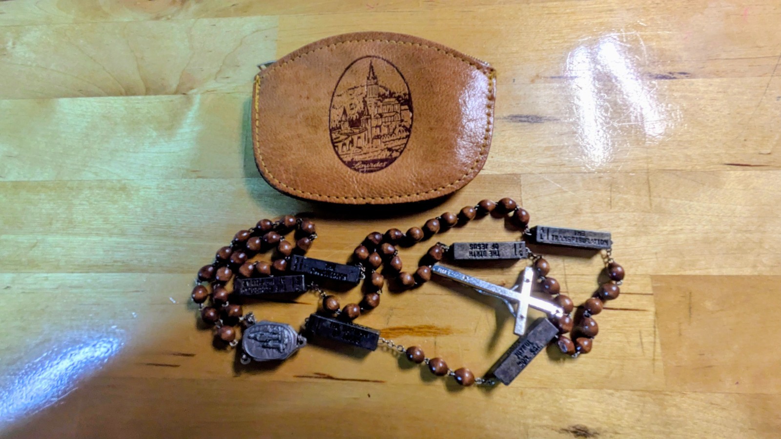 lourdes water, wooden rosary beads, with case