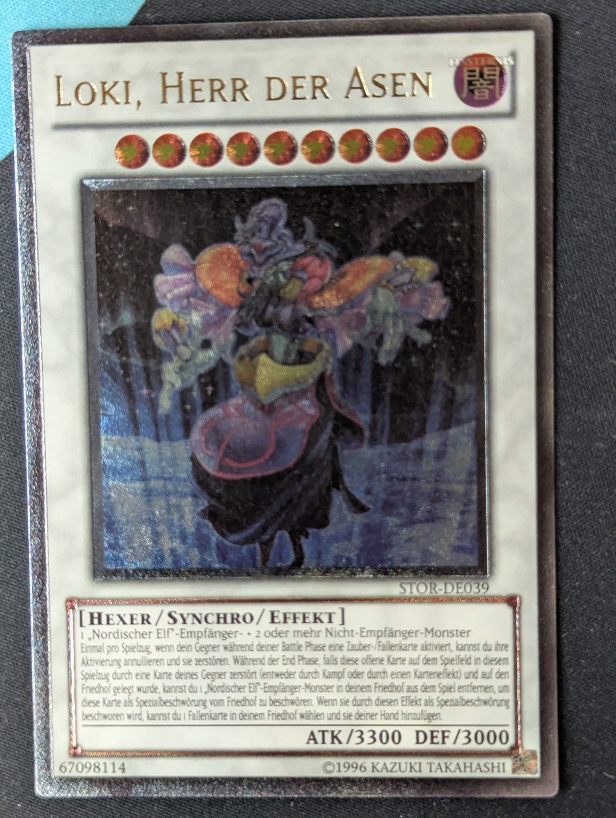 Loki, Lord of the Asgardians STOR-EN039 Ultimate Rare German NM Yugioh