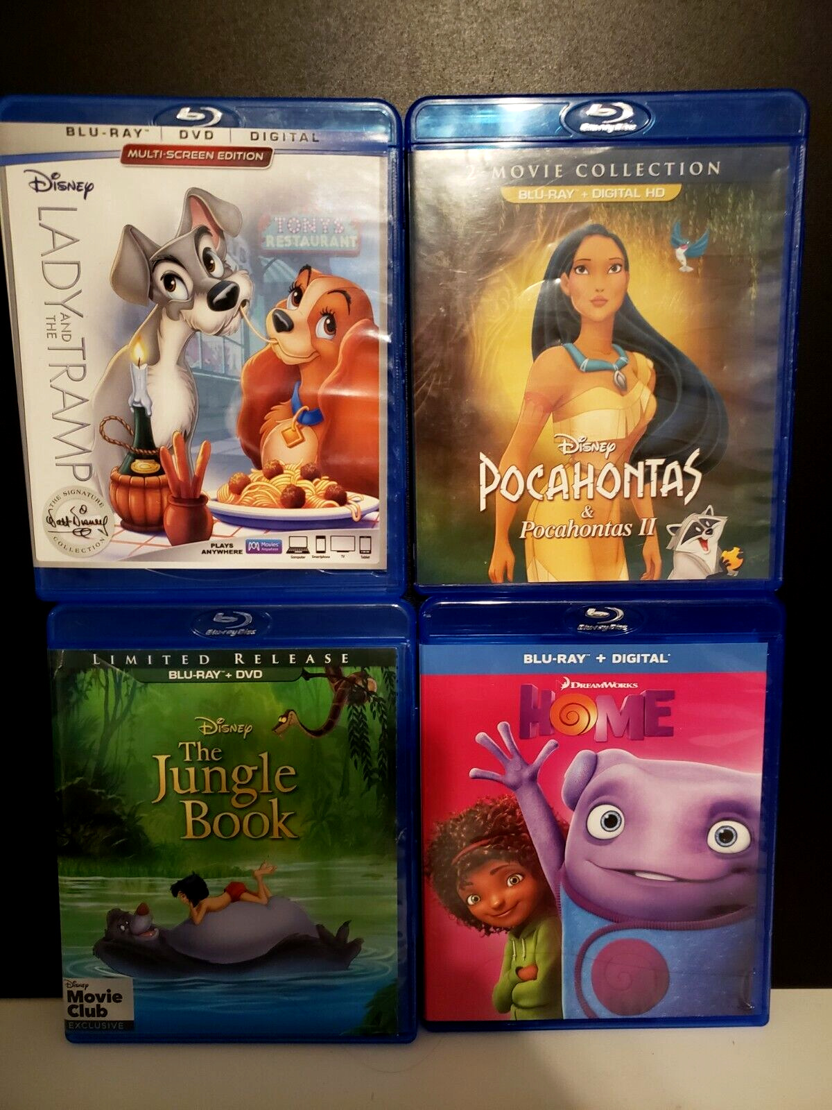 4 kids Disney movies, lady and the tramp, the jungle book, home, pocahontas