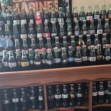 1200 plus different coke bottles  picture