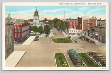 1937 Public Square Bucyrus Ohio Postcard Trolley Cars Main Street Vintage picture