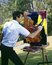 Tony Curtis at work on one of his paintings 1950's in back yard 8x10 inch photo picture