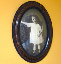  Antique oval portrait of child in tiger-stripe wooden frame convex bubble glass picture