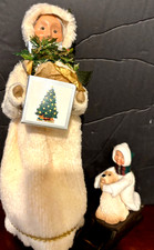 BYERS CHOICE EXLUSIVE OF TALBOTS, SHOPPER W/ CHILD ON SEIGH, CAROLERS' picture
