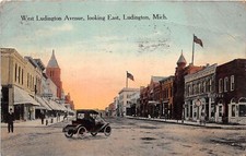 J60/ Ludington Michigan Postcard c1910 West Ludington Ave East Stores 16 picture