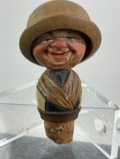 Vintage  Anri Mechanical Bottle Stopper – Carved Man rolling Hat Two Faced picture