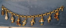 Vintage 1960s Walt Disney Productions Gold Tone Charm Bracelet NOS on Blue Card picture