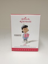 Hallmark Keepsake Ornament 2015 Peanuts Lucy Decking The Tree  picture