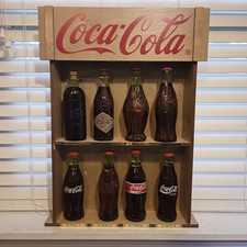 The Coca-Cola Replica Bottle collection, Display Vintage 1899 - 1991 picture