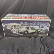 NEW 2004 HESS SPORT UTILITY VEHICLE SUV w/ 2 FRICTION MOTORCYCLES picture