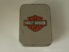 Brushed chrome Zippo featuring a 3D brass Harley-Davidson motorcycle bootstrap picture