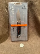 Gerber Vector folding knife,  8452, Blade Edge Partially serrated Discontinued. picture