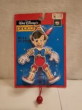 Walt Disneys Pinocchio Pull Puppet New old stock  picture