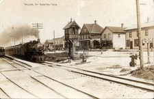 Barton WI Wisconsin Train Engine at Crossing, Stores RPPC Photo Postcard COPY picture