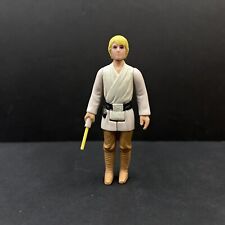 Vintage Star Wars Farm Boy Luke Skywalker and Yellow Lightsaber 1977 Kenner picture