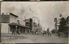 1910 Sisters Oregon Main Street Hotel Gist Motorcycle Old Car RPPC Postcard COPY picture