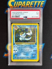 1999 Pokemon Fossil 1st Edition Vaporeon Holo PSA 7 12/64 picture