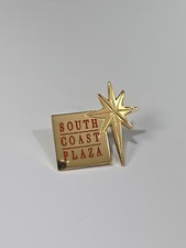 South Coast Plaza Lapel Pin Star With Red Letters & Gold Color Background picture