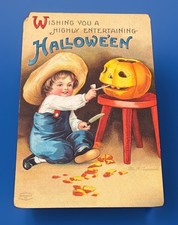 Antique  Embossed Clapsaddle Halloween Postcard Boy Carving Jack-O-Lantern picture