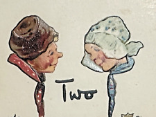 Tucks Christmas Postcard Brundage 5623 Dutch Couple Heads Face Each Other u/s picture