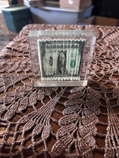 Vintage 1970s The Shrinking Dollar Lucite Paperweight picture