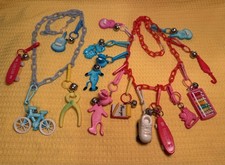 Vintage 1980s Plastic Bell Charm Necklace Lot  15 Clip-On Charms  2 Chains Retro picture