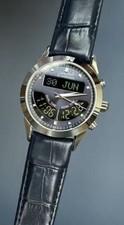 Stylish Azan watch with dual time, Qibla, calendar, and blue leather strap. picture