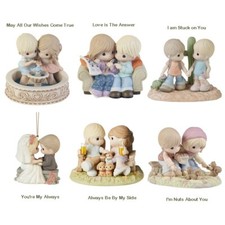 Precious Moments Figurines- Retired-New In Box. picture