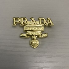 Beautiful Elegant Luxury Light Gold Colored Brooch By Prada picture