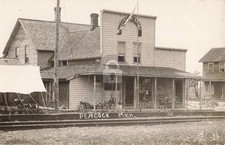 Railroad by Hotel, Store & P.O., Peacock MI Michigan RPPC Photo Postcard COPY picture