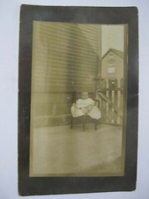 BABY SITTING IN CHAIR OUTSIDE PORTRAIT REAL PHOTO POSTCARD 1910 RPPC picture