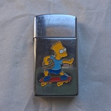Zippo Slim Bart Simpson Lighter on Chrome Skateboard Bradford PA picture
