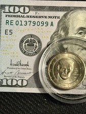 100.00 Bill Signed By Donald Trump And 1.00 Golden Dollar Featuring Donald Trump picture