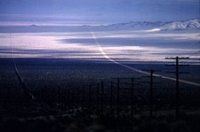 Between Los Angeles Las Vegas telegraph poles run parallel a highw- Old Photo picture