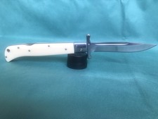 A unique, handcrafted folding pocket knife with a 440C steel blade. picture
