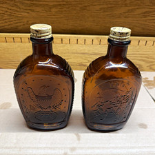 Vintage 1976 Log Cabin Syrup Bicentennial Amber Bottles 1776 Lot of 2 w/ Caps picture