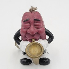 California 1987 Vintage Raisin Saxophone Player Keychain picture