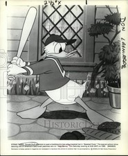 1948 Press Photo Donald Duck swats bee in 