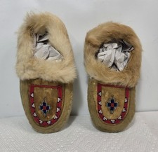 Pair of tan Deer Hide? leather moccasins featuring red, blue, white, bead Work picture