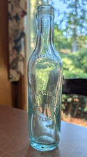 VINTAGE Sea Blue Koca Nola, Florida Bottling Co, Tooled Top Circle Slug Soda picture
