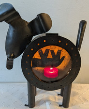 Rustic Black Metal Dog-shaped  Tealight Candle Holder with Circular Cutout. picture