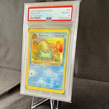 Pokémon 1999 Fossil Omanyte 1st Edition #52 PSA 8 Cert 143942094 picture