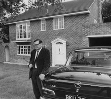 English novelist John Braine author of 'Room Top' moves into new h- Old Photo picture